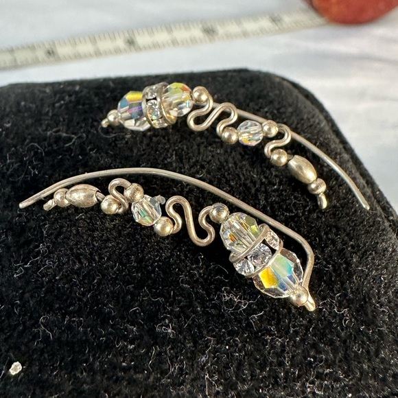 Three silvertone hoops and ear hugger - Picture 4 of 5